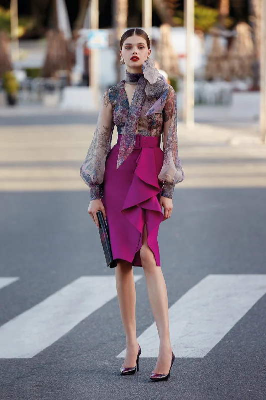 Printed shirt paired with short skirt leather skirt sleek